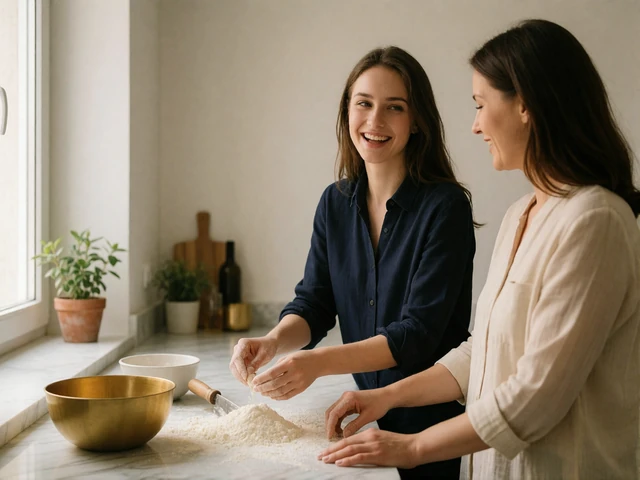 Young Slavic woman laughing with her mother while preparing food together at a bright kitchen counter